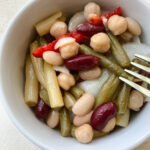 Yiayia's Bean Salad in a white ramekin.