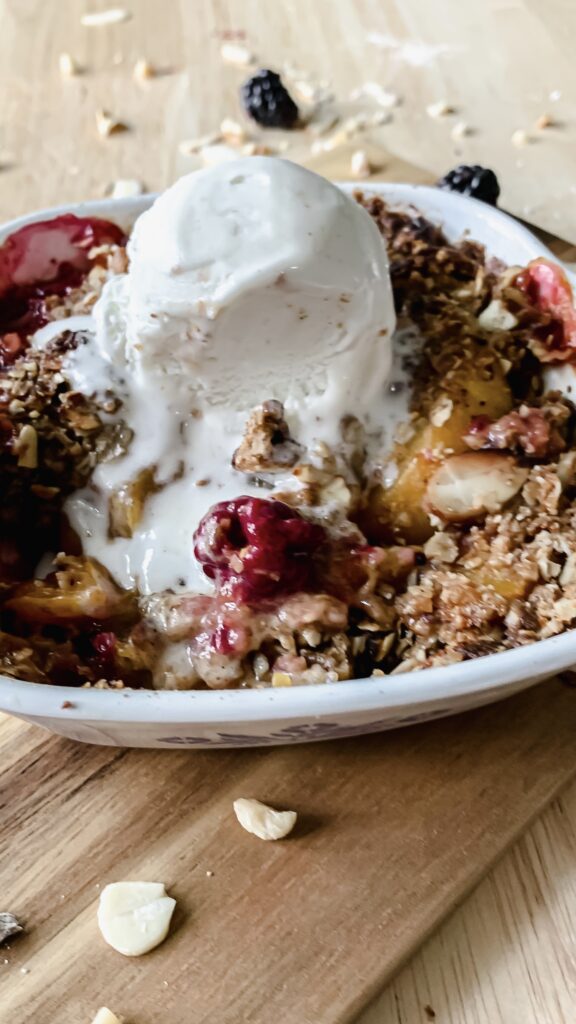 blackberry peach cobbler with vanilla ice cream